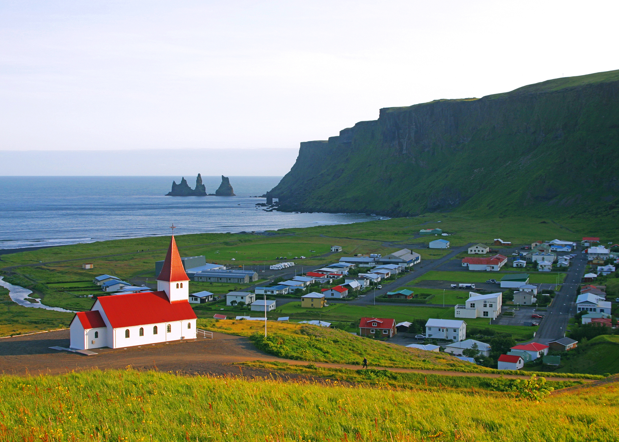 spend time in the quaint town of Vik